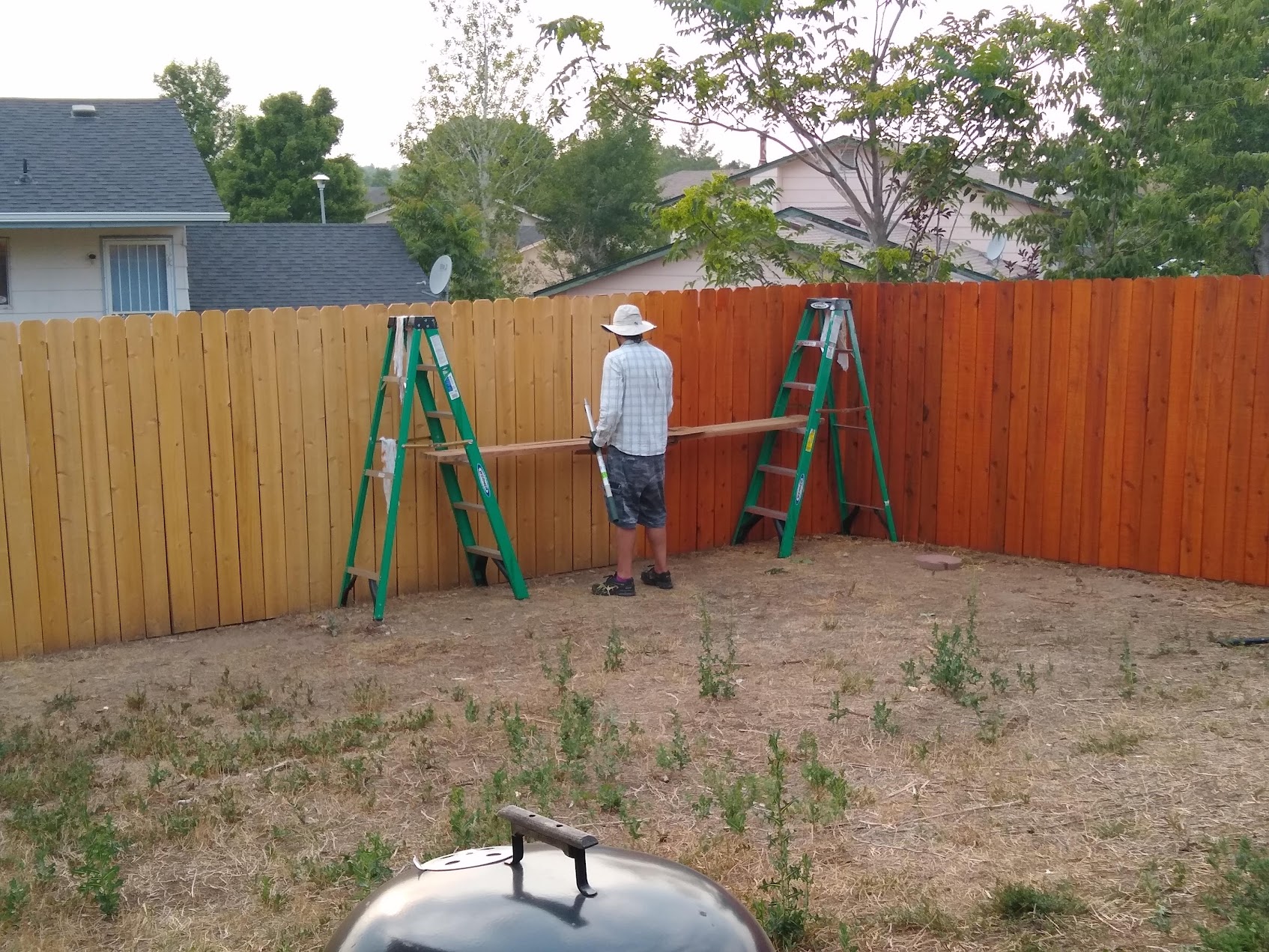 staining a fence for protection